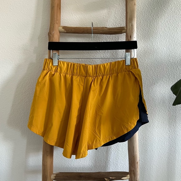 Free People Movement Run For It Mustard Yellow and Navy Shorts NWOT - Picture 9 of 10